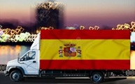 Camión de transporte por carretera y bandera de España